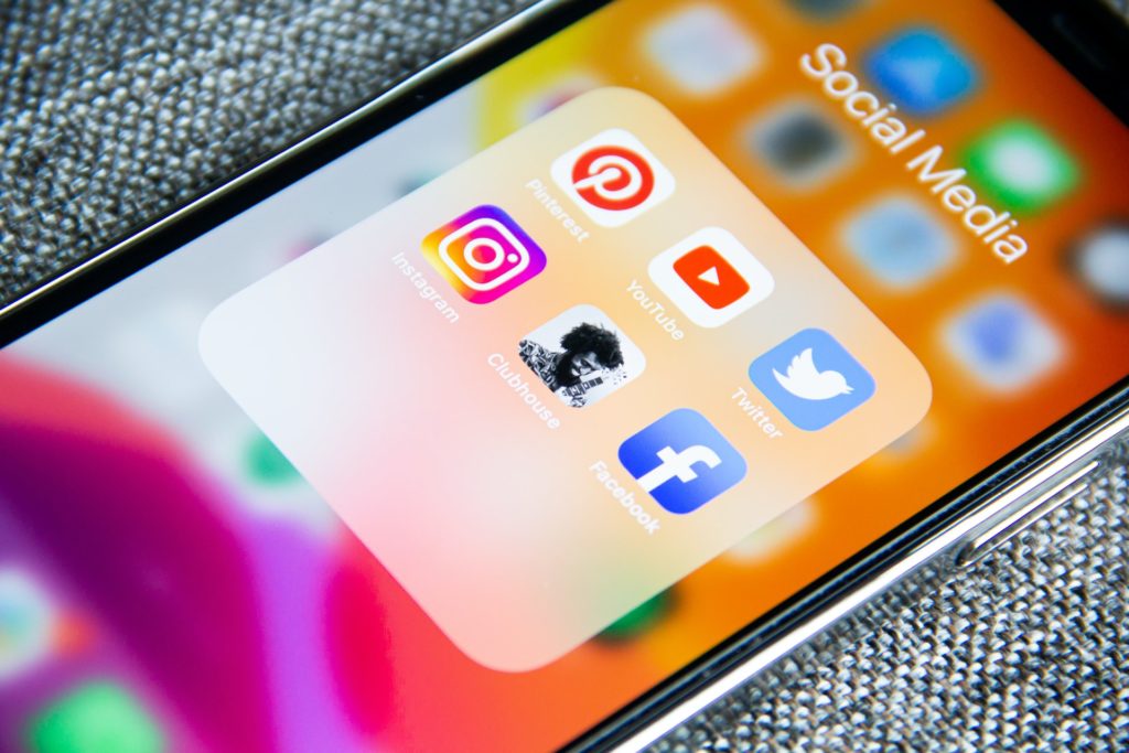 A phone with social media apps installed.