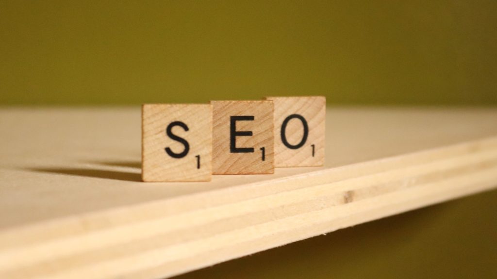 Wooden blocks forming the word "SEO."