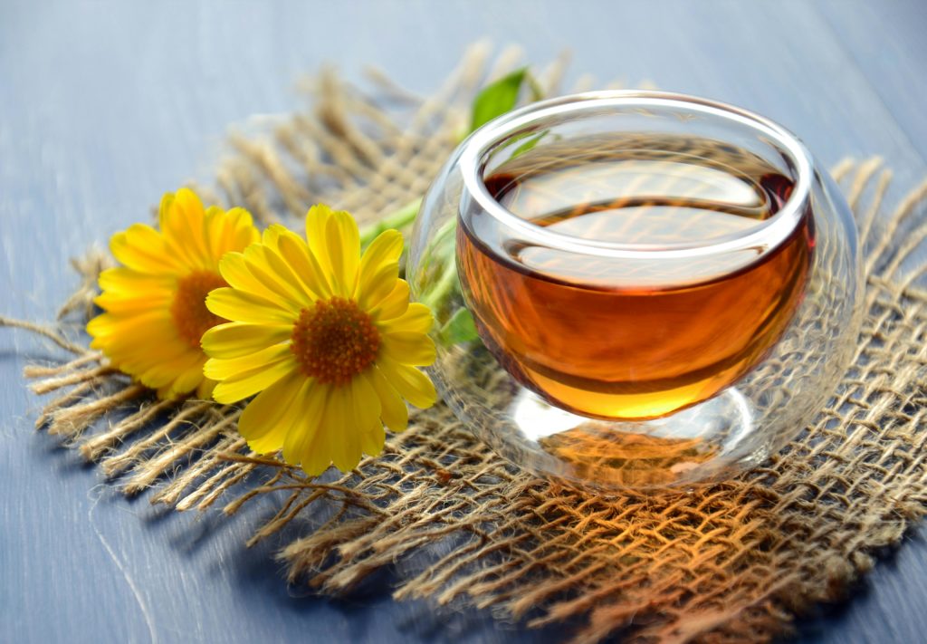 DIY Herbal Hair Rinses for Color Enhancement and Shine